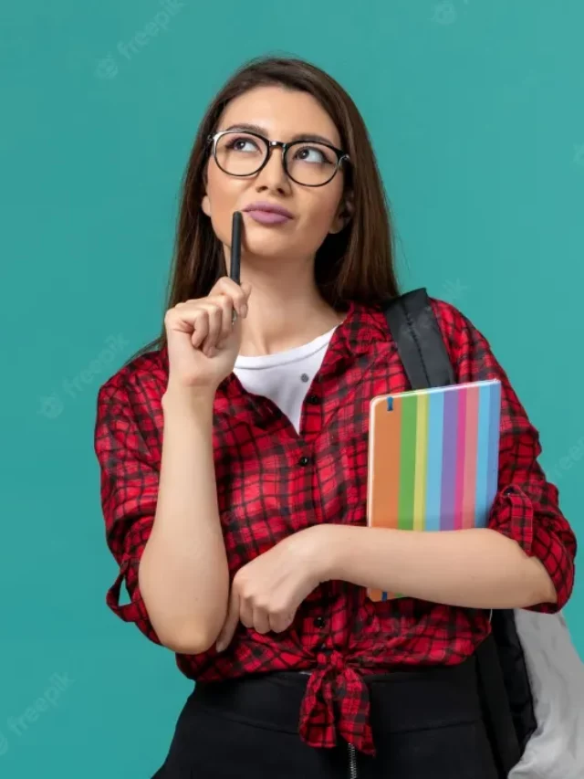 front-view-female-student-wearing-backpack-holding-copybook-pen-thinking-blue-wall_140725-46520